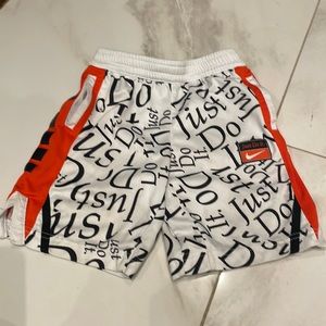 In like new condition. White black and orange. Dri fit